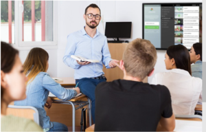 Teacher talking to students with Clear Touch in background