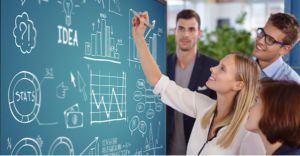 Woman writing on interactive Board